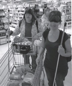 Heidi Propp and Elizabeth Lalonde (in sleep shades) grocery shopping at a Victoria supermarket.
