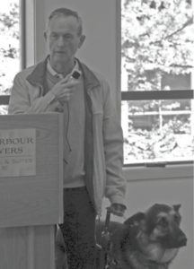 Graeme McCreath and guide dog Marsh. Photo Credit: Daryl Jones